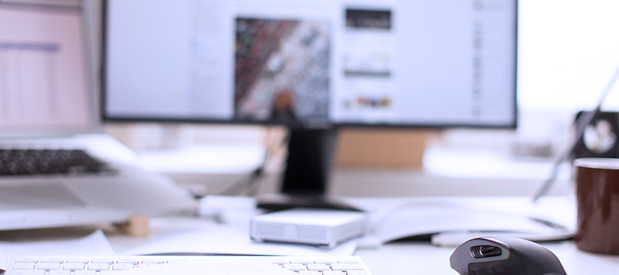 laptop with mouse and keypad