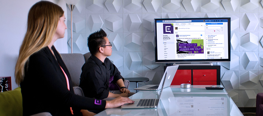 two people watching a Facebook tutorial