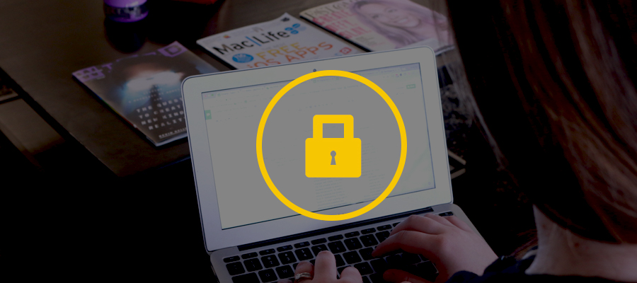 A computer with a yellow lock icon over the screen.