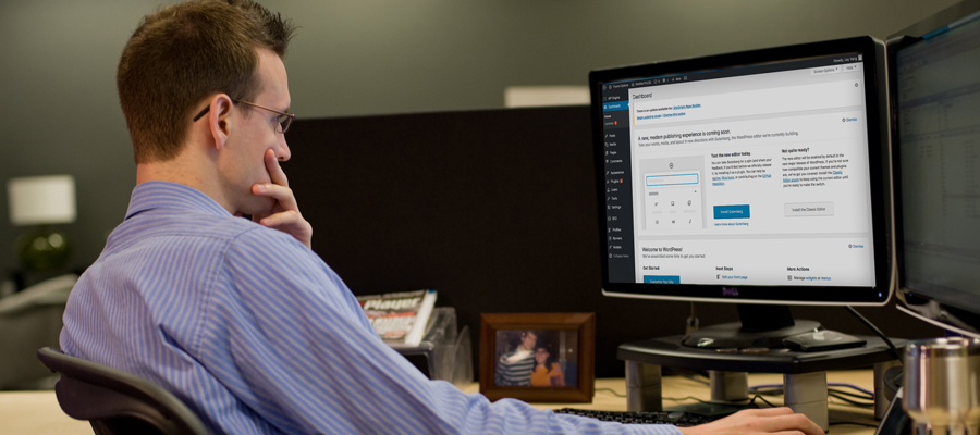 Neal working at his computer
