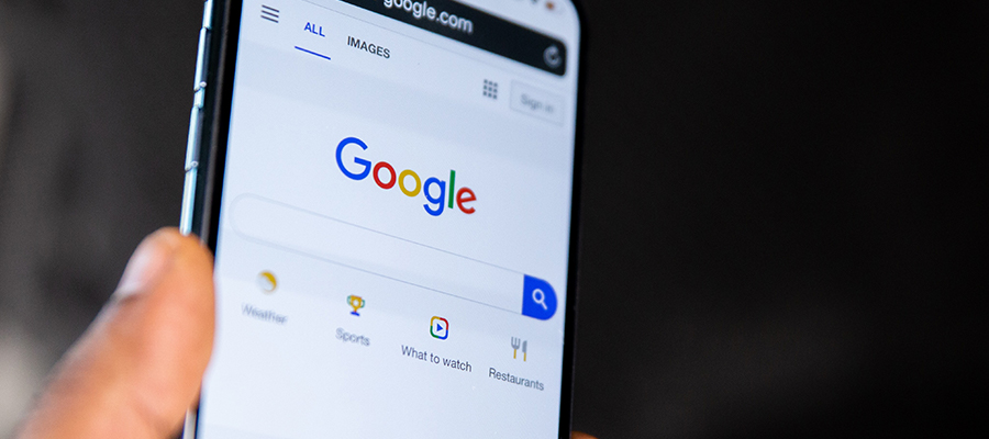 photo of phone with google on the screen