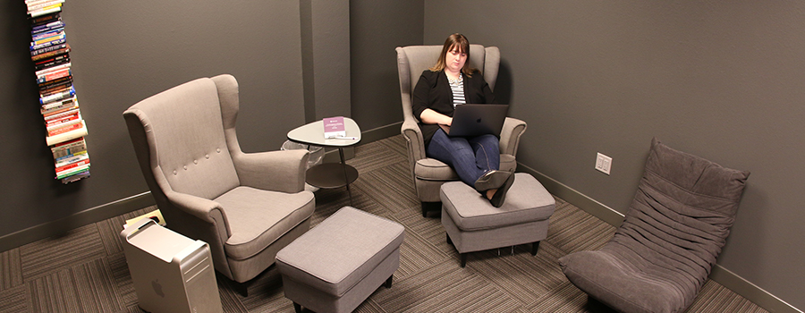 An Envano employee working in a flexible workspace.