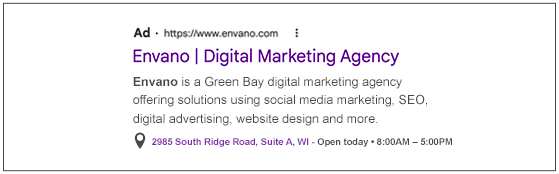 Example of a Google ad and google ad extensions show the location extension. 