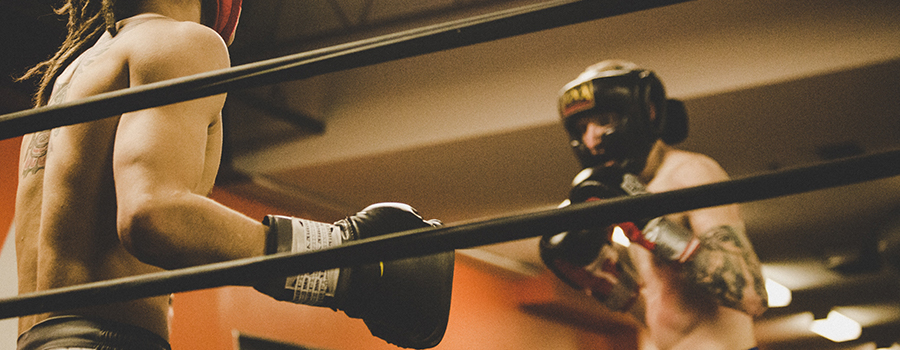Opponents face off in a kickboxing match. SEO quick wins are like a boxing match with Google.